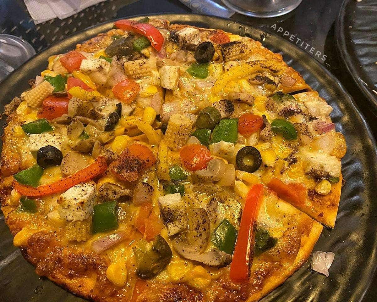 A farmhouse veg pizza straight off the pan
